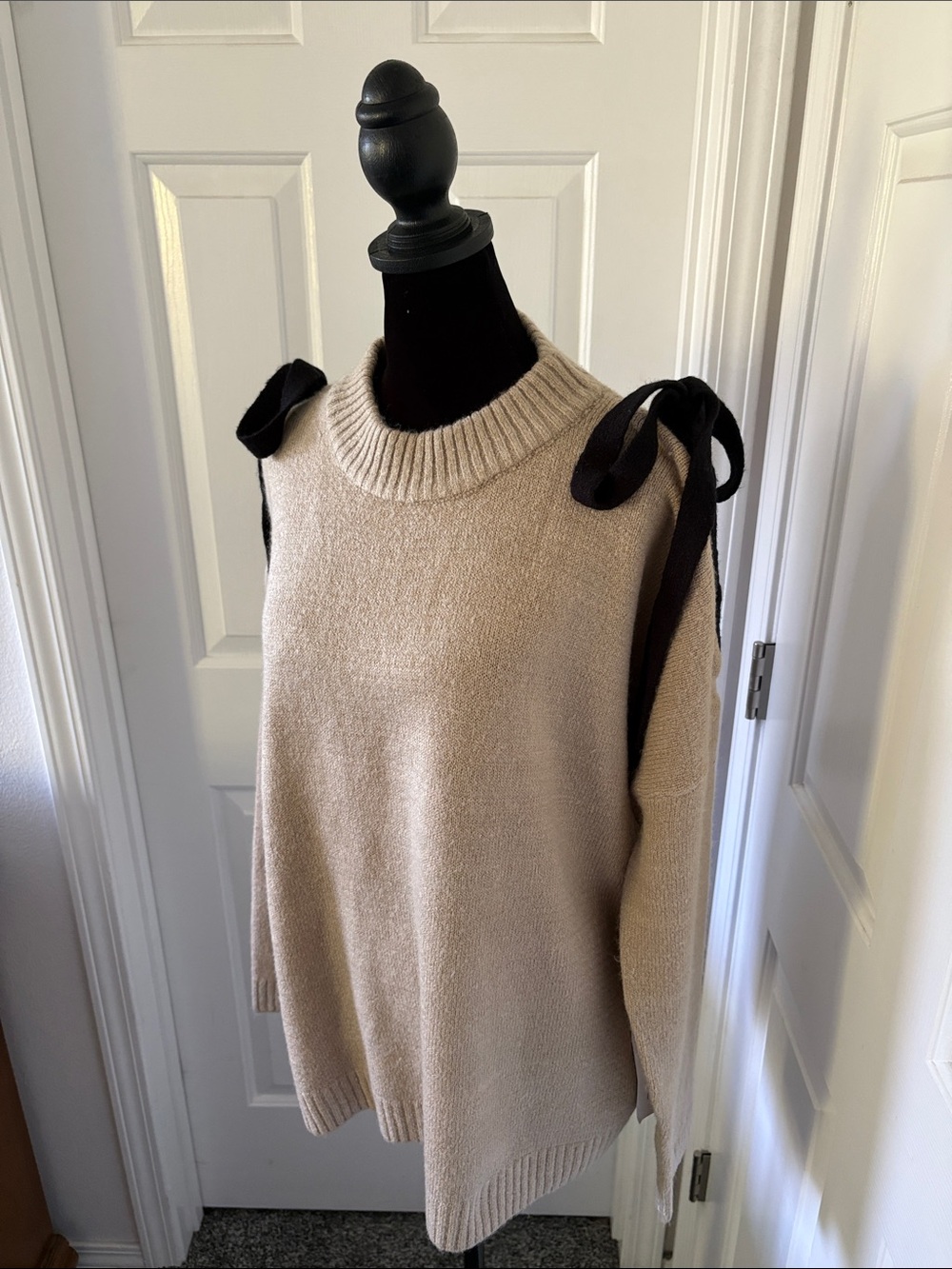 Lumiere’s Beige Cold-Shoulder Knit Sweater with Black Tie Details - Picture 3 of 13